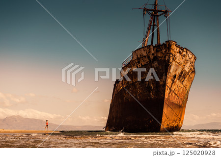 Tourist woman on beach enjoying vacation Tourist woman on beach enjoying vacation 125020928