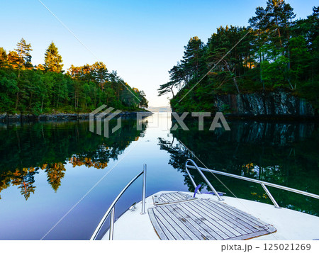 Motor boat on water Motor boat on water 125021269