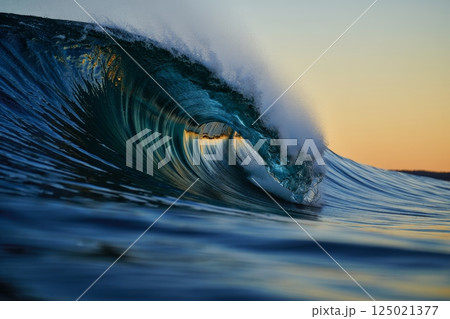 Huge breaking wave crashing in ocean 125021377