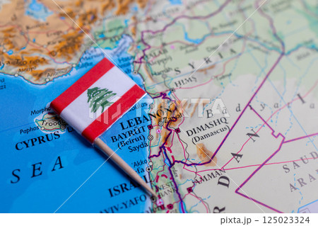 A close-up of the flag of Lebanon on the map. Capital Beirut. A close-up of the world map. Lebanon A close-up of the flag of Lebanon on the map. Capital Beirut. A close-up of the world map. Lebanon 125023324