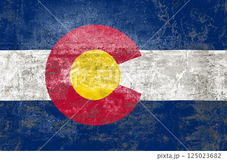Colorado State Flag. Dirty Colorado state flag on the wall. 125023682