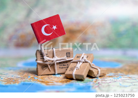 Flag of Turkey near the parcels on the world map. World trade. Exports and imports of goods. Economy of the country. 125023750
