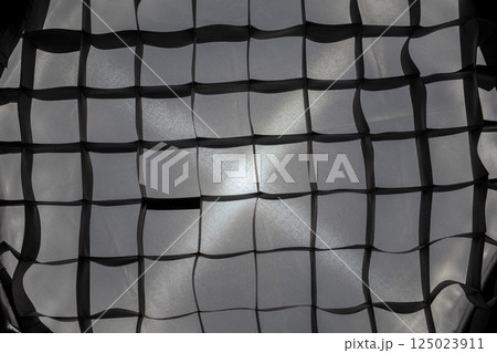 Softbox interior. Abstract textured background with intersecting monochrome geometric shapes and lighting effects 125023911