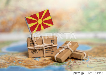 Shipping and Delivery Packages to North Macedonia: International Mail Service with Small Parcels on Vintage Map Background Shipping and Delivery Packages to North Macedonia: International Mail Service with Small Parcels on Vintage Map Background 125023943