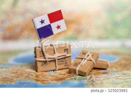 Parcels and Panama Flag on World Map: International Shipping and Postal Delivery Service Concept Parcels and Panama Flag on World Map: International Shipping and Postal Delivery Service Concept 125023981