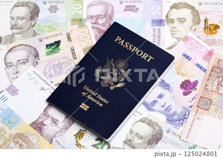 American passport on a Ukrainian money 125024801
