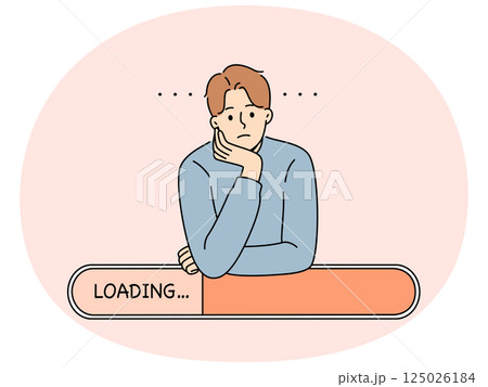 Man is experiencing problems due to poor internet networks and relies on loading line. 125026184