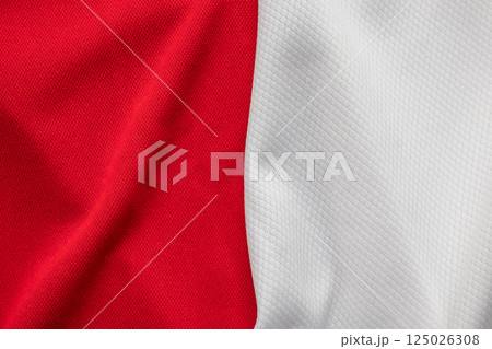 White and red sports clothing fabric football shirt jersey texture background 125026308