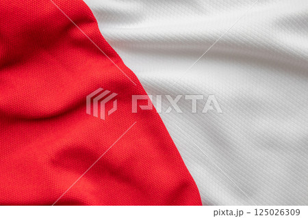 White and red sports clothing fabric football shirt jersey texture background 125026309