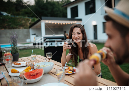 Portrait of handsome man during family barbecue. 125027541