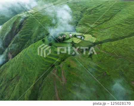 Aerial view of beautiful high altitude forest grassland mountain landscape Aerial view of beautiful high altitude forest grassland mountain landscape 125028170