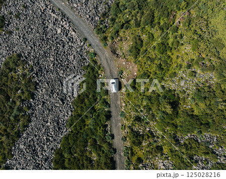 Driving off road car on high altitude mountains Driving off road car on high altitude mountains 125028216