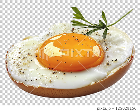 A perfectly cooked fried egg in its shell, seasoned with pepper and garnished with fresh herbs. A perfectly cooked fried egg in its shell, seasoned with pepper and garnished with fresh herbs. 125029156