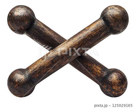 Rustic wooden boneshaped objects, crossed in an X shape, evoke a sense of age and possible symbolism. 125029165