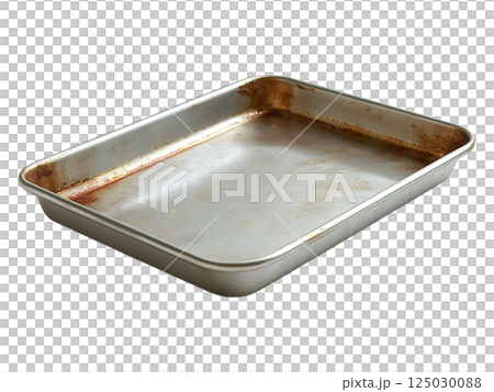 A wellused, rustic metal baking sheet shows signs of age and many uses. Its slightly stained and worn surface adds character, perfect for rustic, vintage, or nostalgic concepts. A wellused, rustic metal baking sheet shows signs of age and many uses. Its slightly stained and worn surface adds character, perfect for rustic, vintage, or nostalgic concepts. 125030088