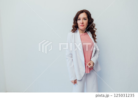 woman looking on white office background woman looking on white office background 125031235