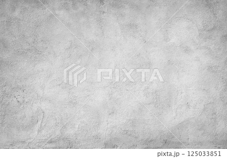 Textured gray concrete wall surface with visible plaster patterns and subtle tonal variations, ideal as a background or texture 125033851