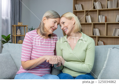 Two friends spending time together and feeling peaceful 125034862