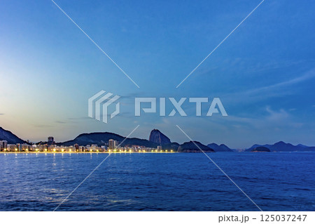 Dusk on Copacabana beach in Rio de Janeiro city 125037247