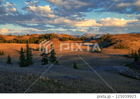 Sunset Over Serene Mountain Landscape 125039925