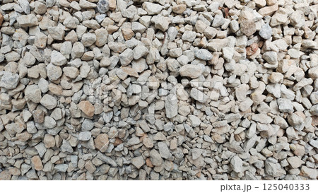 Close Up of Light Gray Gravel Texture with Various Rock Sizes for Construction and Landscaping Projects 125040333
