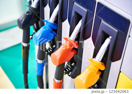 Fuel nozzles on filling station Fuel nozzles on filling station 125042063