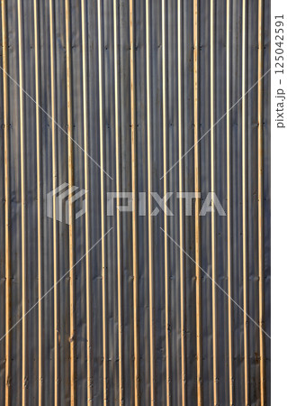 Metal Sheet, Galvanized Iron plate, gray corrugated metal cladding use as wall. 125042591