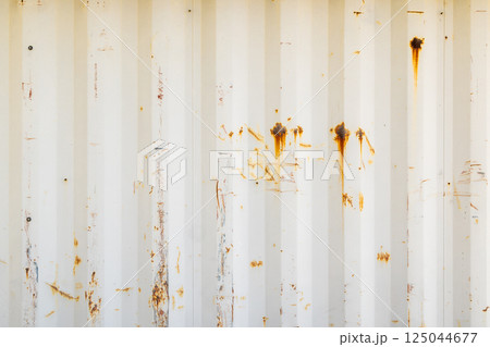 white corrugated steel sheet texture with rust spots and stains 125044677