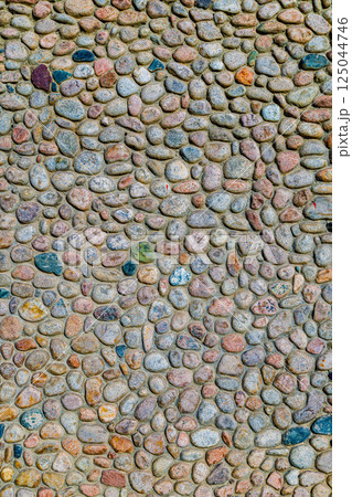 Round cobblestone decorated wall 125044746