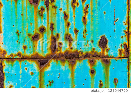 Aqua metal with rust drips and spots 125044790