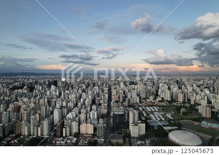 Birds eye view of Sao Paulo skyline with dramatic clouds at sunset 125045673