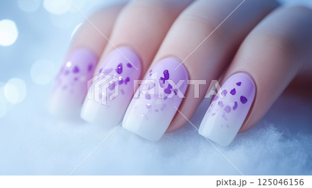 Delicate lavender nail design featuring light purple petals on a fresh white background, ideal for weddings and social events 125046156