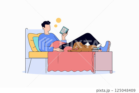 Man Reading with Dog on Bed 125048409