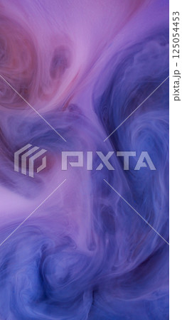 Ink splash water. Fluid cloud. Defocused blue purple colorful mix flow spray liquid fluttering on abstract art creative background. 125054453