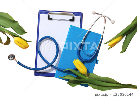 Nursing tools paired with bright yellow tulips for celebration, isolated on white Nursing tools paired with bright yellow tulips for celebration, isolated on white 125056144