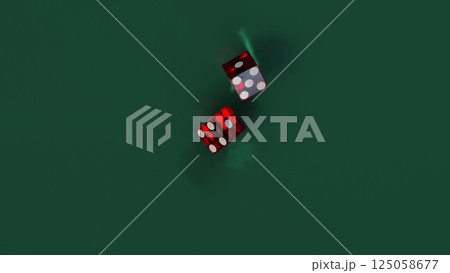 Two red dice fall onto a green table for casino craps game Two red dice fall onto a green table for casino craps game 125058677