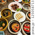 A variety of food, from southern Thailand, on the dining table 125058713