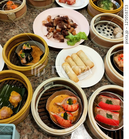 A variety of food, from southern Thailand, on the dining table 125058713