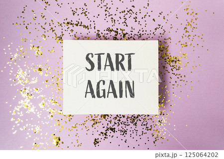 White card with the words start again written on it White card with the words start again written on it 125064202