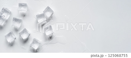 Melting ice cubes on a white background Melting ice cubes on a white background 125068755