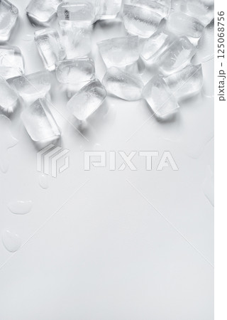 Melting ice cubes on a white background 125068756