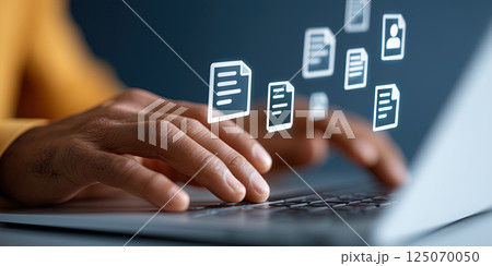 person typing on laptop with floating digital document icons, symbolizing online forms person typing on laptop with floating digital document icons, symbolizing online forms 125070050