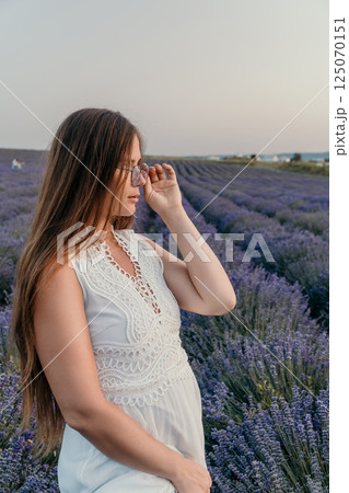 Lavender Fields Woman Dress France: Summer Sunset Portrait, Peaceful Pose. Lavender Fields Woman Dress France: Summer Sunset Portrait, Peaceful Pose. 125070151