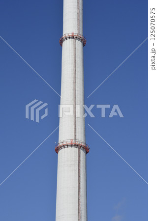 Tall concrete chimney 125070575