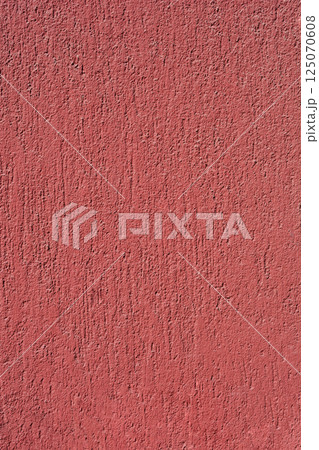 Textured red wall Textured red wall 125070608