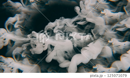 Paint drop. Atmospheric smoke. Defocused white color water flow chemical wet splash floating on abstract art dark black background. 125071079