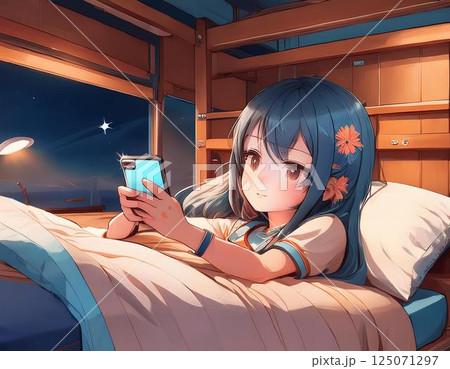 ゲストハウスのドミトリーでスマホを見ている人 125071297