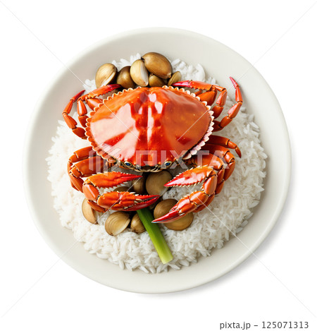 Poo Pad Pao - Stir-fried crab with garlic, chili, and vegetables, served with steamed rice. The juicy crab, coated 125071313