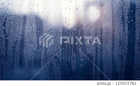 雨の日の窓ガラスに広がる水滴とぼやけた自然の風景 エモーショナルな背景 125072762