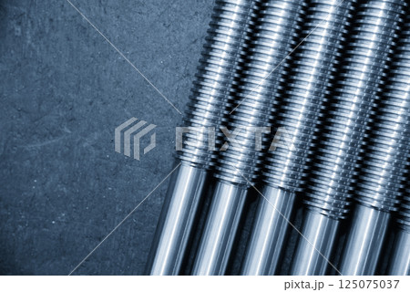 Closeup scene the spare parts  lead ball screw shaft in the light blue scene. 125075037